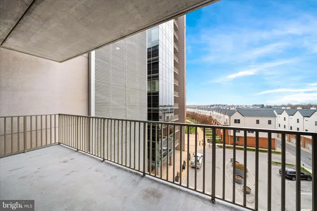 a view of balcony with furniture