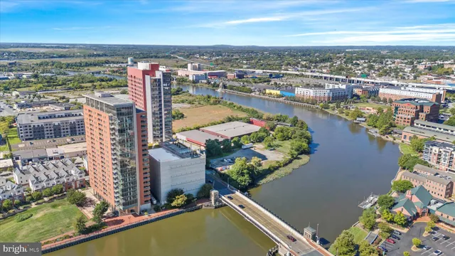 an aerial view of a house with a lake view