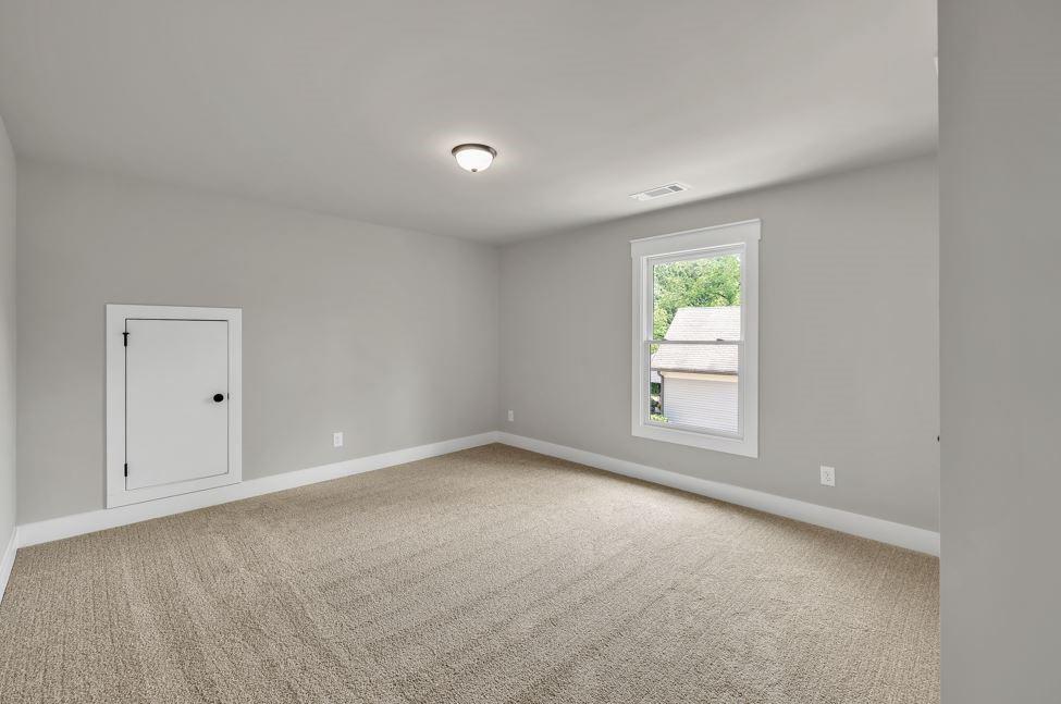 231 East Marable Street Monroe, GA 30655 - Photo 26 of 36 a view of an empty room with a window