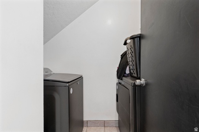 165 Pheasantbrook Drive Centerville, UT 84014 - Photo 24 of 30 Laundry room featuring independent washer and dryer and light tile patterned floors