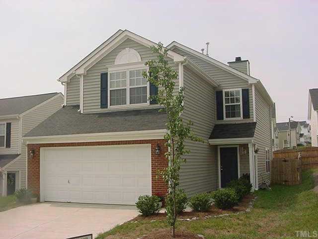 4813 Mocha Lane Raleigh, NC 27616 - Photo 1 of 1 a front view of a house with a yard and garage