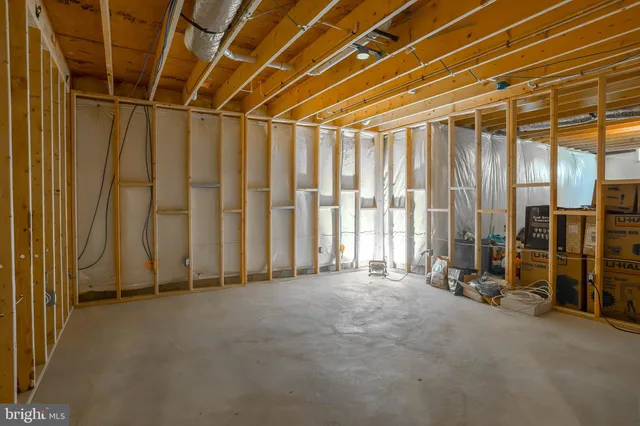 a view of an empty room with stairs