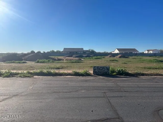 a view of a lake with a big yard