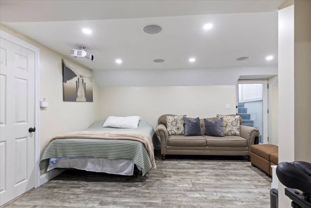 19 Warren Avenue Saugus, MA 01906 - Photo 20 of 33 a bedroom with a bed and couch