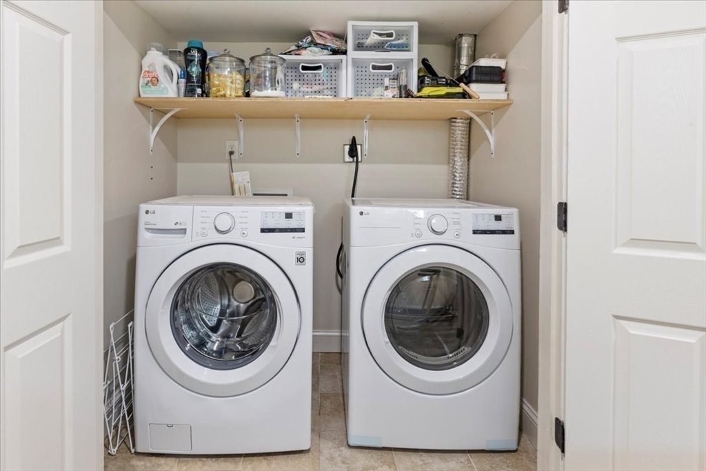 19 Warren Avenue Saugus, MA 01906 - Photo 21 of 33 a utility room with dryer and washer