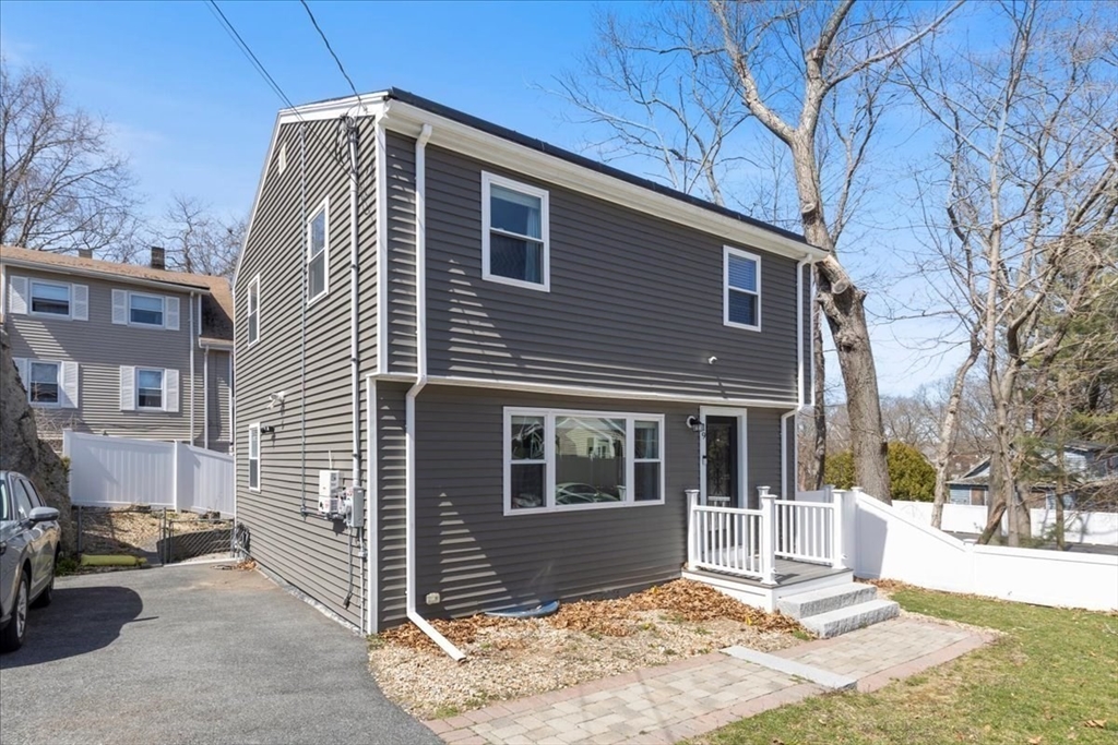 19 Warren Avenue Saugus, MA 01906 - Photo 26 of 33 a view of a house with a yard