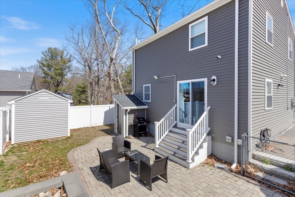 19 Warren Avenue Saugus, MA 01906 - Photo 27 of 33 a view of a patio with iron fence