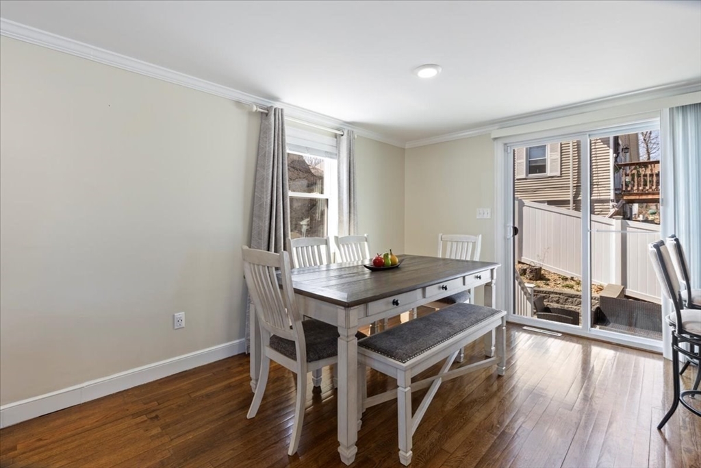 19 Warren Avenue Saugus, MA 01906 - Photo 7 of 33 a view of a workspace with furniture and wooden floor