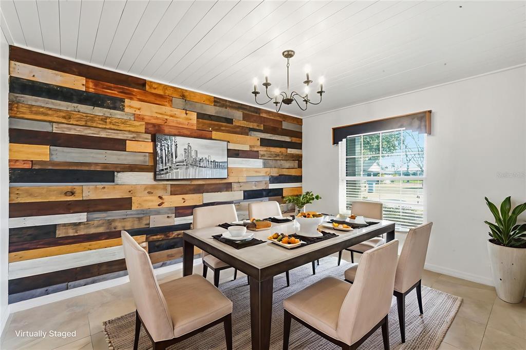 5309 South Farkas Road Plant City, FL 33567 - Photo 13 of 43 a view of a dining room with furniture window and wooden floor