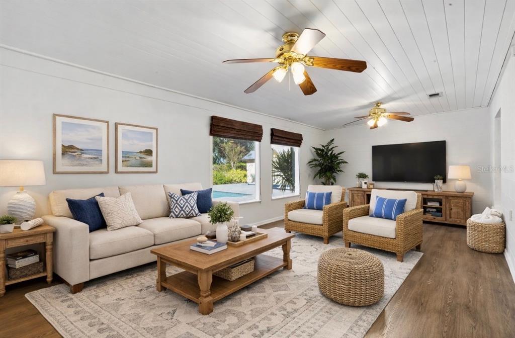 5309 South Farkas Road Plant City, FL 33567 - Photo 20 of 43 a living room with furniture and a flat screen tv