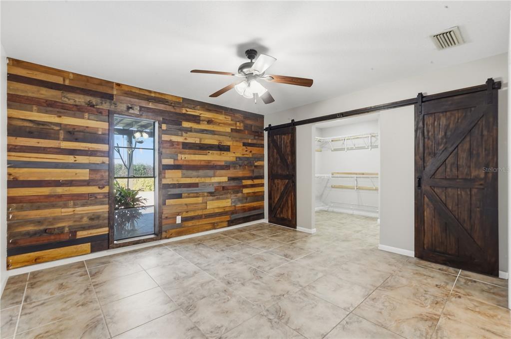 5309 South Farkas Road Plant City, FL 33567 - Photo 24 of 43 a view of an empty room with cabinet and a window