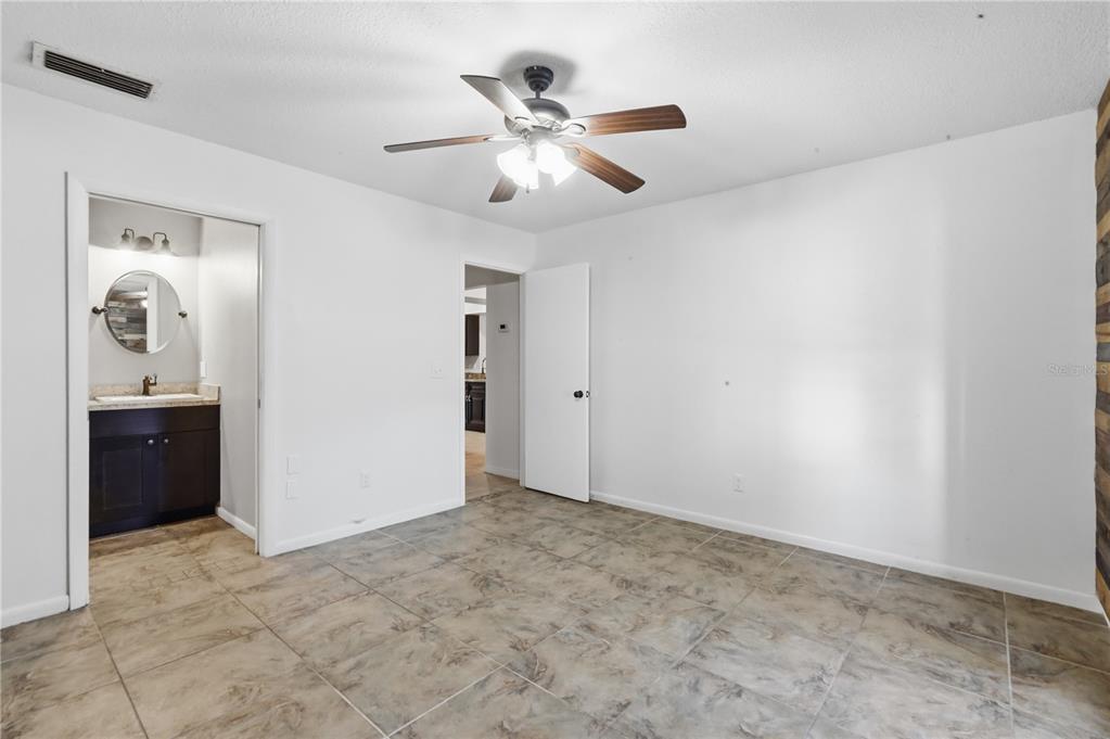 5309 South Farkas Road Plant City, FL 33567 - Photo 26 of 43 a view of an empty room with a bathroom
