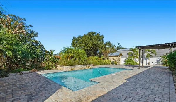 a view of a street with a yard