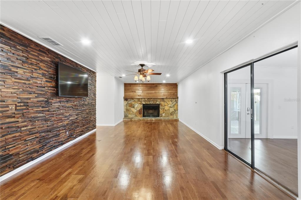 5309 South Farkas Road Plant City, FL 33567 - Photo 6 of 43 a view of a livingroom with wooden floor