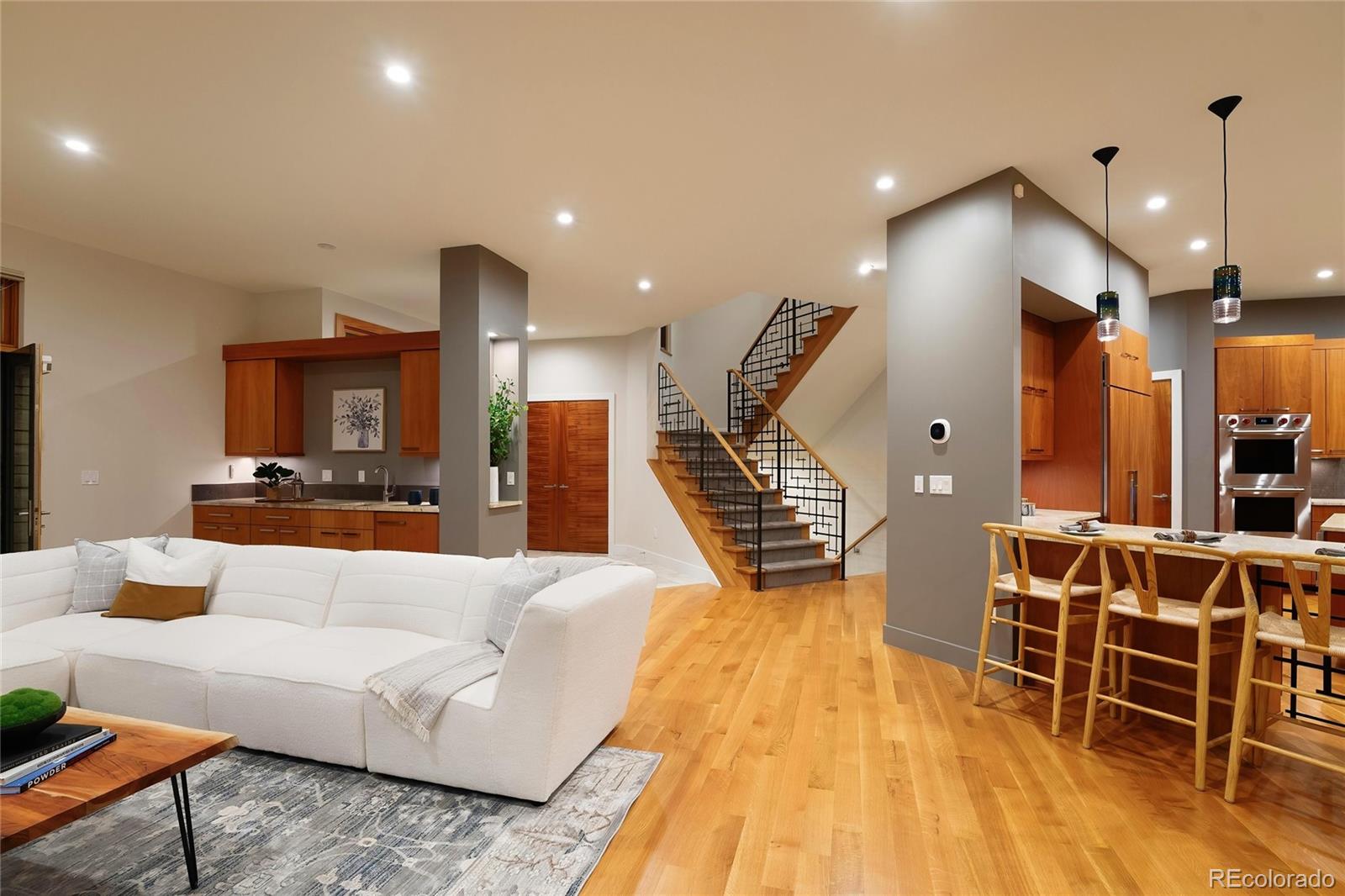 755 Jonquil Place Boulder, CO 80304 - Photo 11 of 40 a living room with furniture and kitchen view