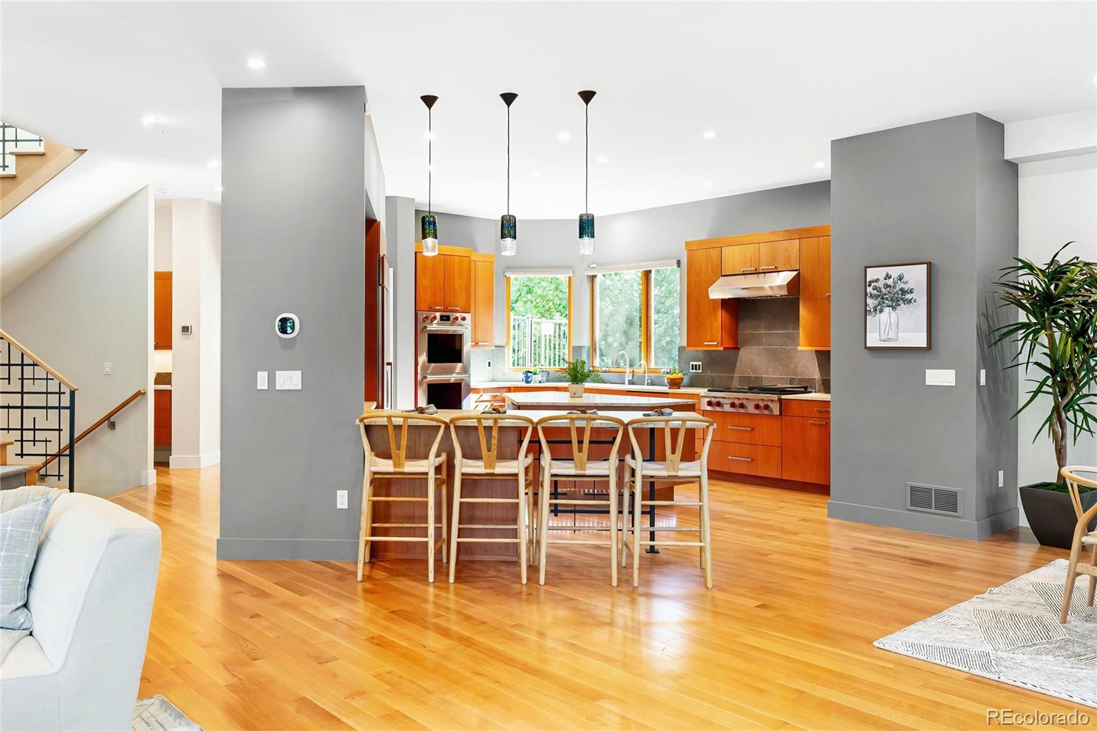 755 Jonquil Place Boulder, CO 80304 - Photo 13 of 40 a dining table with chairs and kitchen view