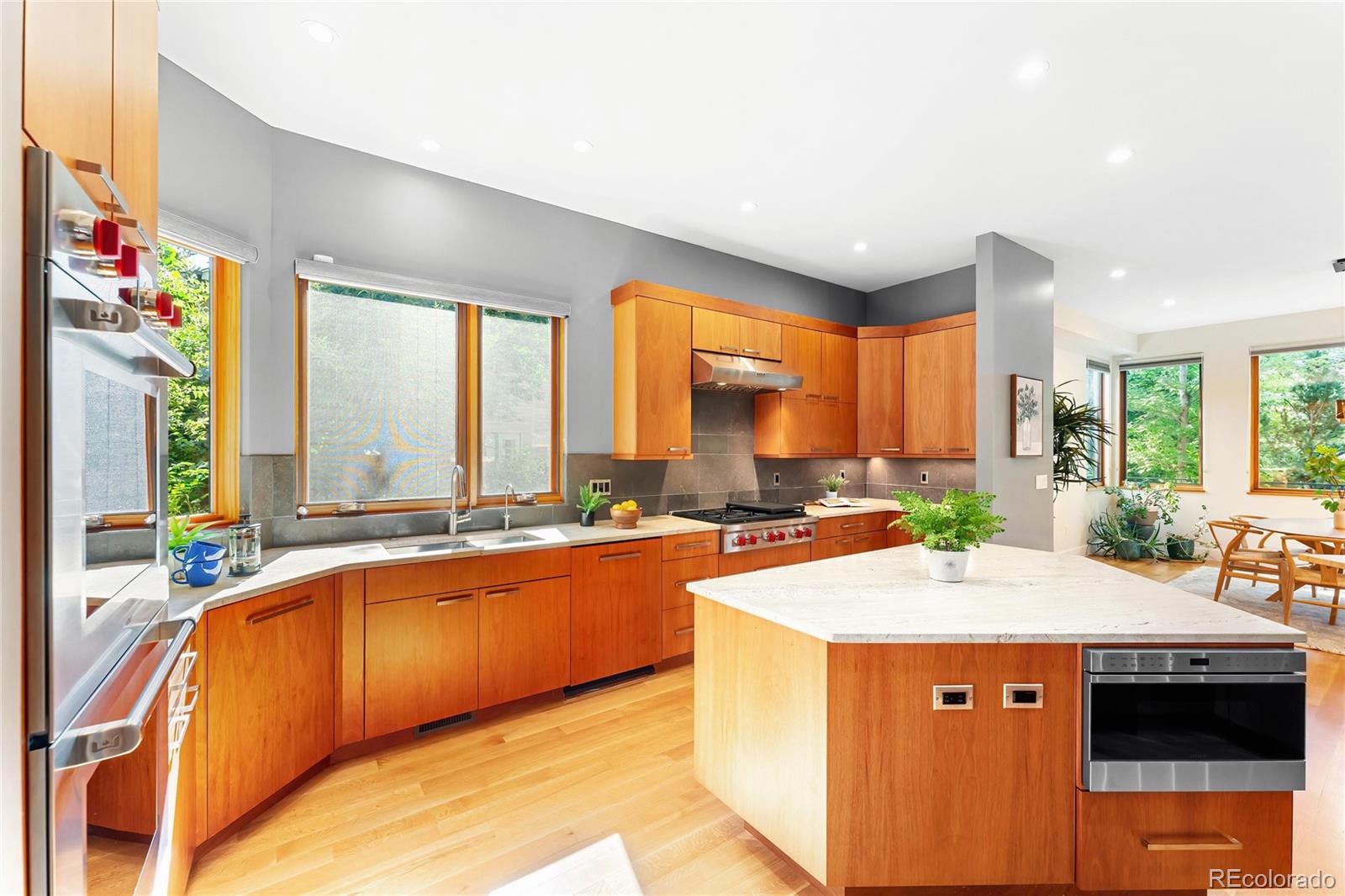 755 Jonquil Place Boulder, CO 80304 - Photo 16 of 40 a kitchen with a sink stove and cabinets