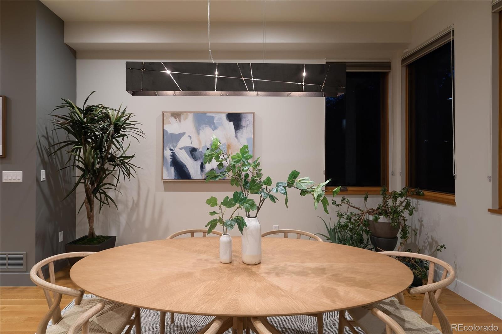 755 Jonquil Place Boulder, CO 80304 - Photo 17 of 40 a table with chairs and potted plant