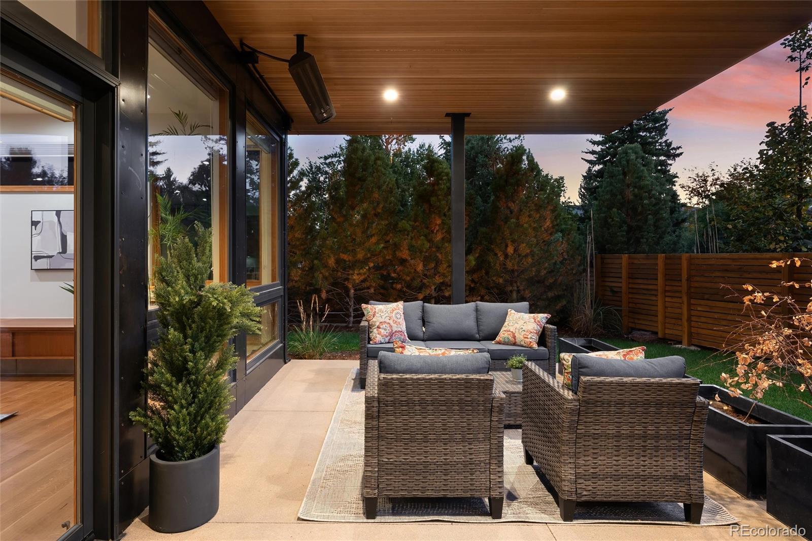 755 Jonquil Place Boulder, CO 80304 - Photo 18 of 40 a patio with patio a couch and potted plants