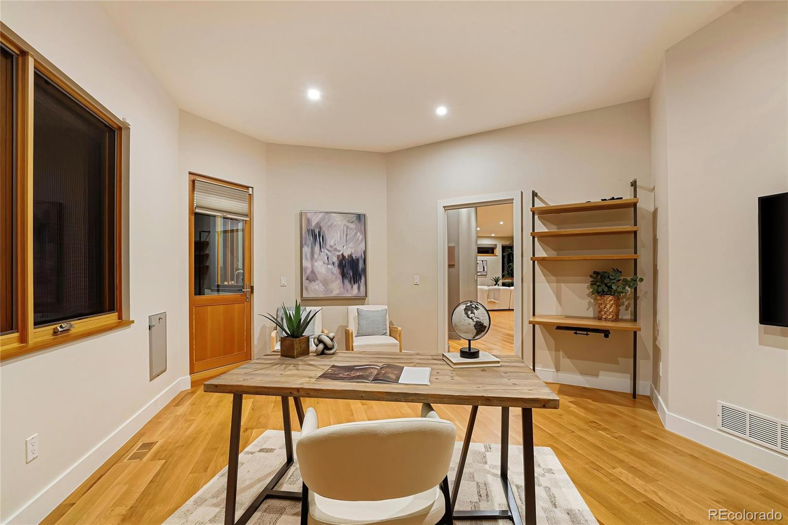755 Jonquil Place Boulder, CO 80304 - Photo 20 of 40 a dining room with wooden floor and large window