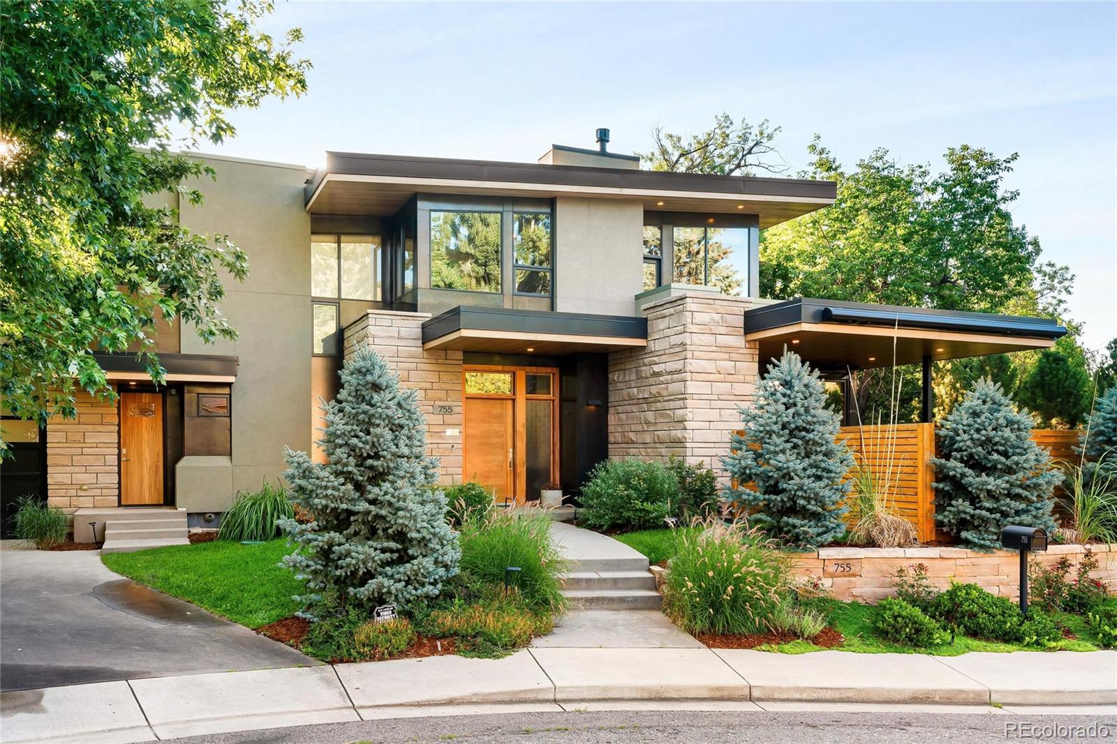 755 Jonquil Place Boulder, CO 80304 - Photo 2 of 40 a front view of a house with garden