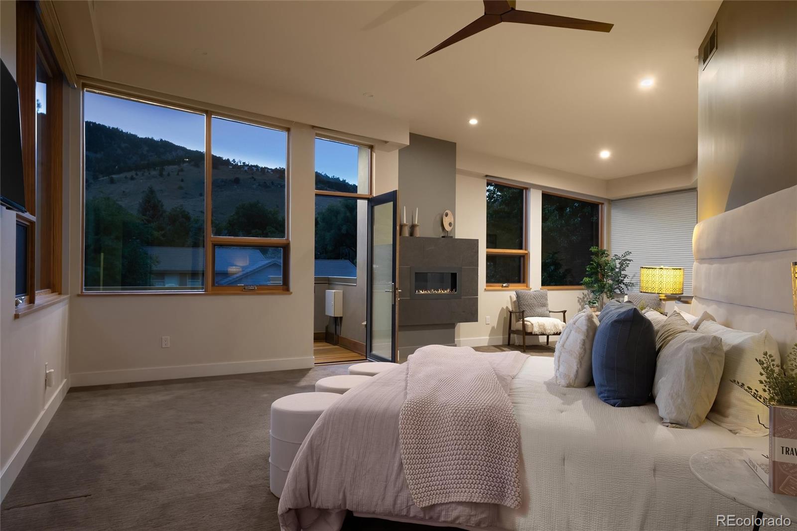 755 Jonquil Place Boulder, CO 80304 - Photo 24 of 40 a bedroom with a bed and a large window