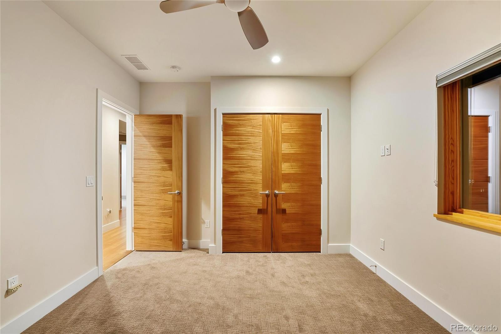 755 Jonquil Place Boulder, CO 80304 - Photo 31 of 40 an empty room with windows