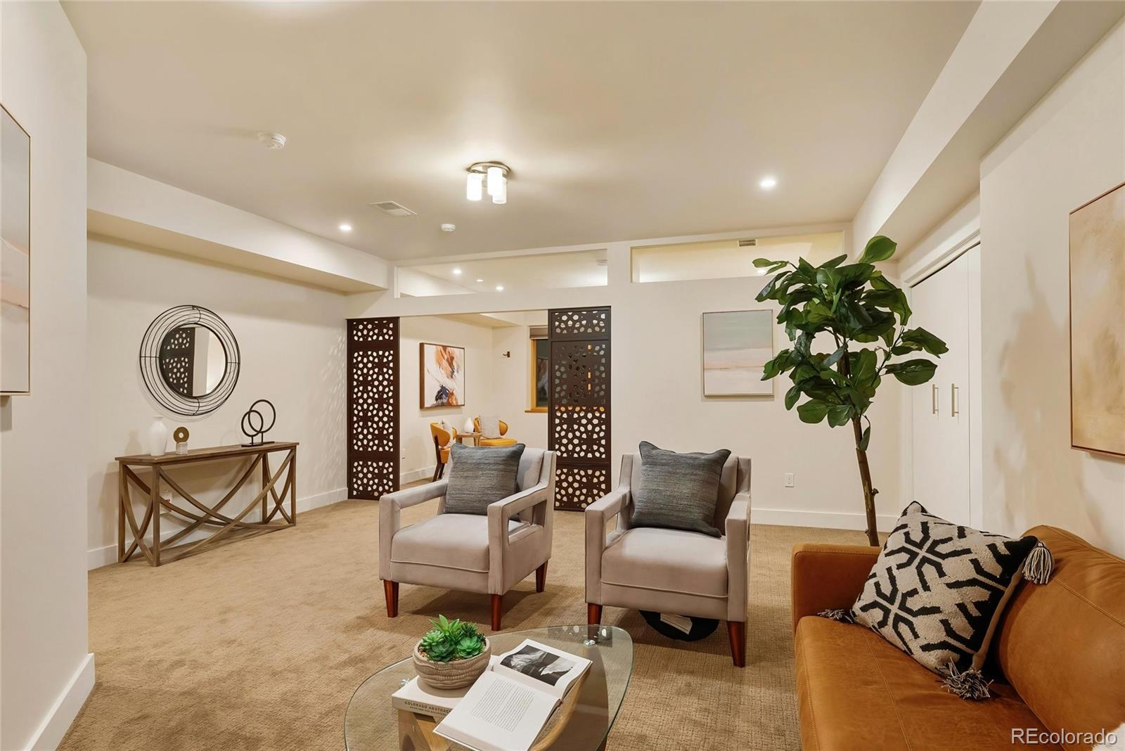 755 Jonquil Place Boulder, CO 80304 - Photo 33 of 40 a living room with furniture and a potted plant