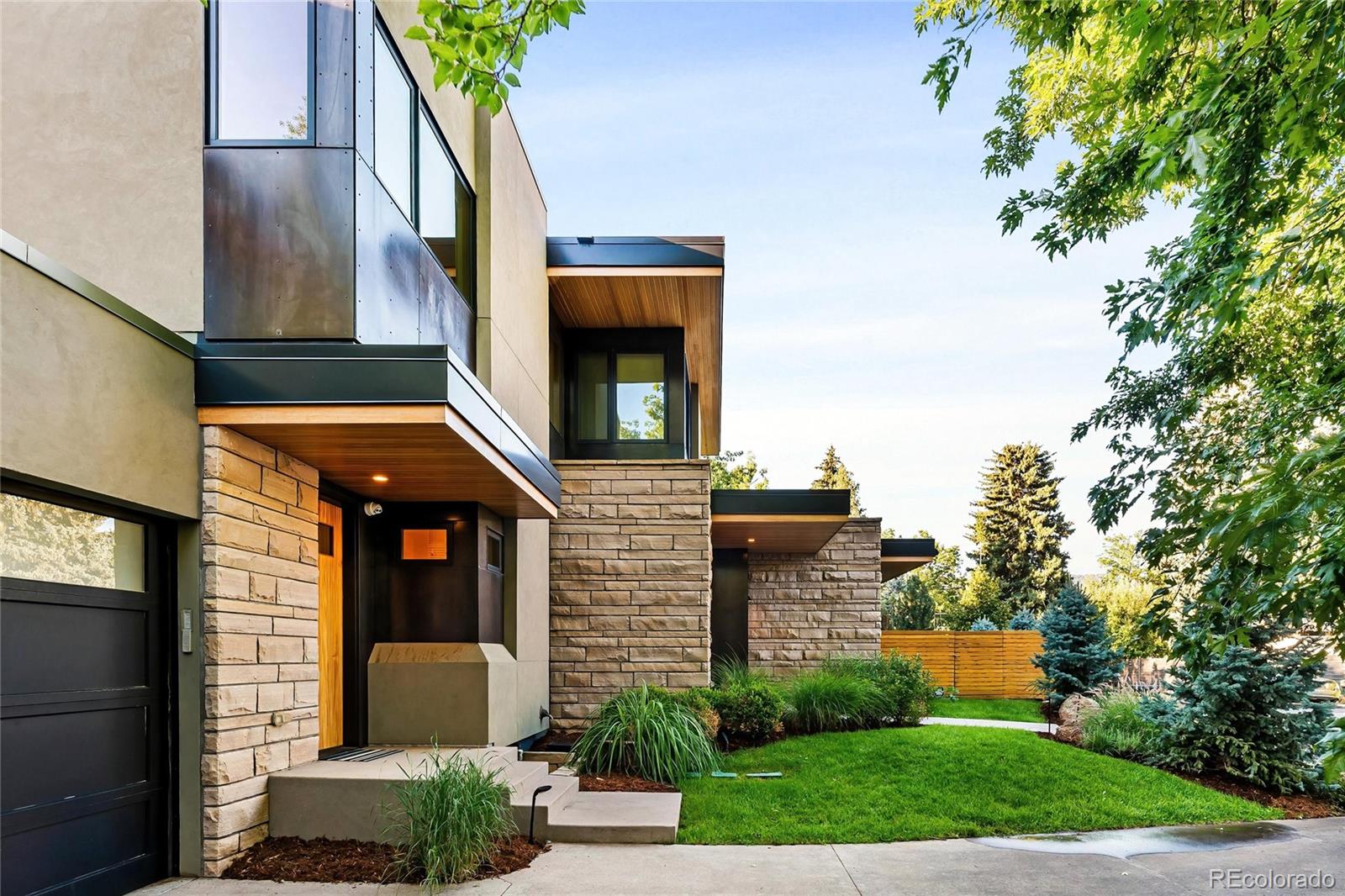 755 Jonquil Place Boulder, CO 80304 - Photo 4 of 40 a front view of a house with garden
