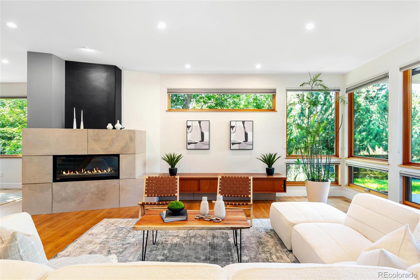 755 Jonquil Place Boulder, CO 80304 - Photo 7 of 40 a living room with furniture and a fireplace