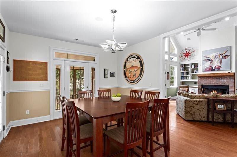 12 Rosalyn Road Georgetown, GA 39854 - Photo 18 of 82 a view of a dining room with furniture and wooden floor