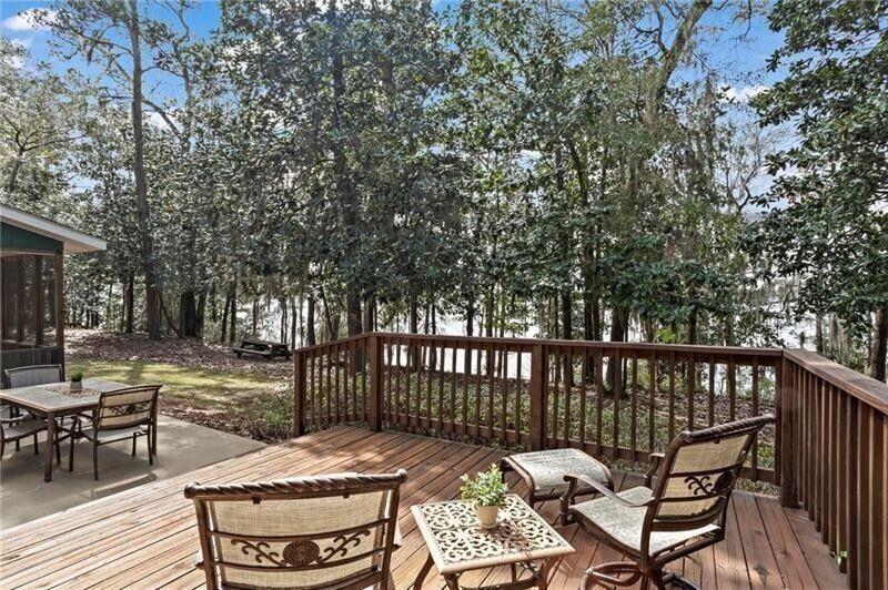 12 Rosalyn Road Georgetown, GA 39854 - Photo 26 of 82 a view of a chairs and table on the wooden floor