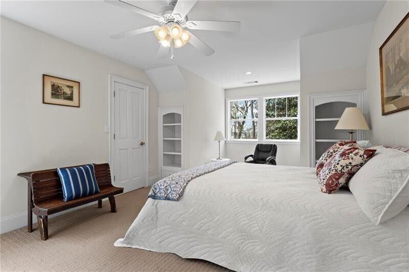 12 Rosalyn Road Georgetown, GA 39854 - Photo 35 of 82 a bedroom with a bed and a chandelier