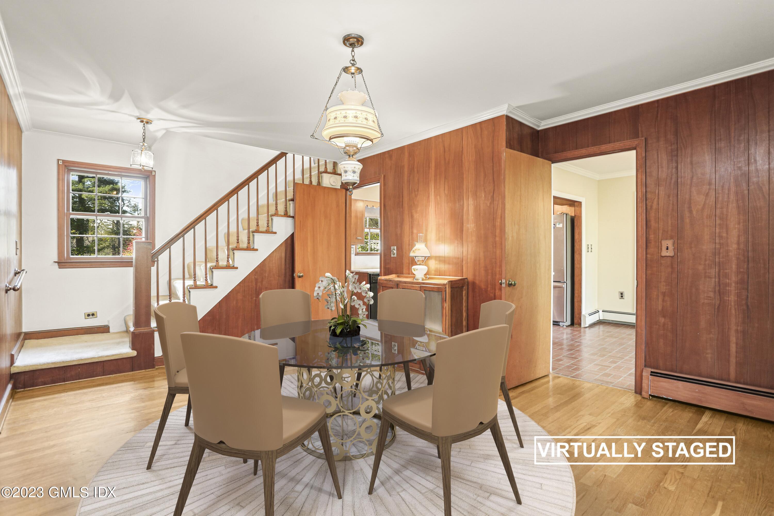 277 Riversville Road Greenwich, CT 06831 - Photo 7 of 23 a view of a dining room with furniture and wooden floor