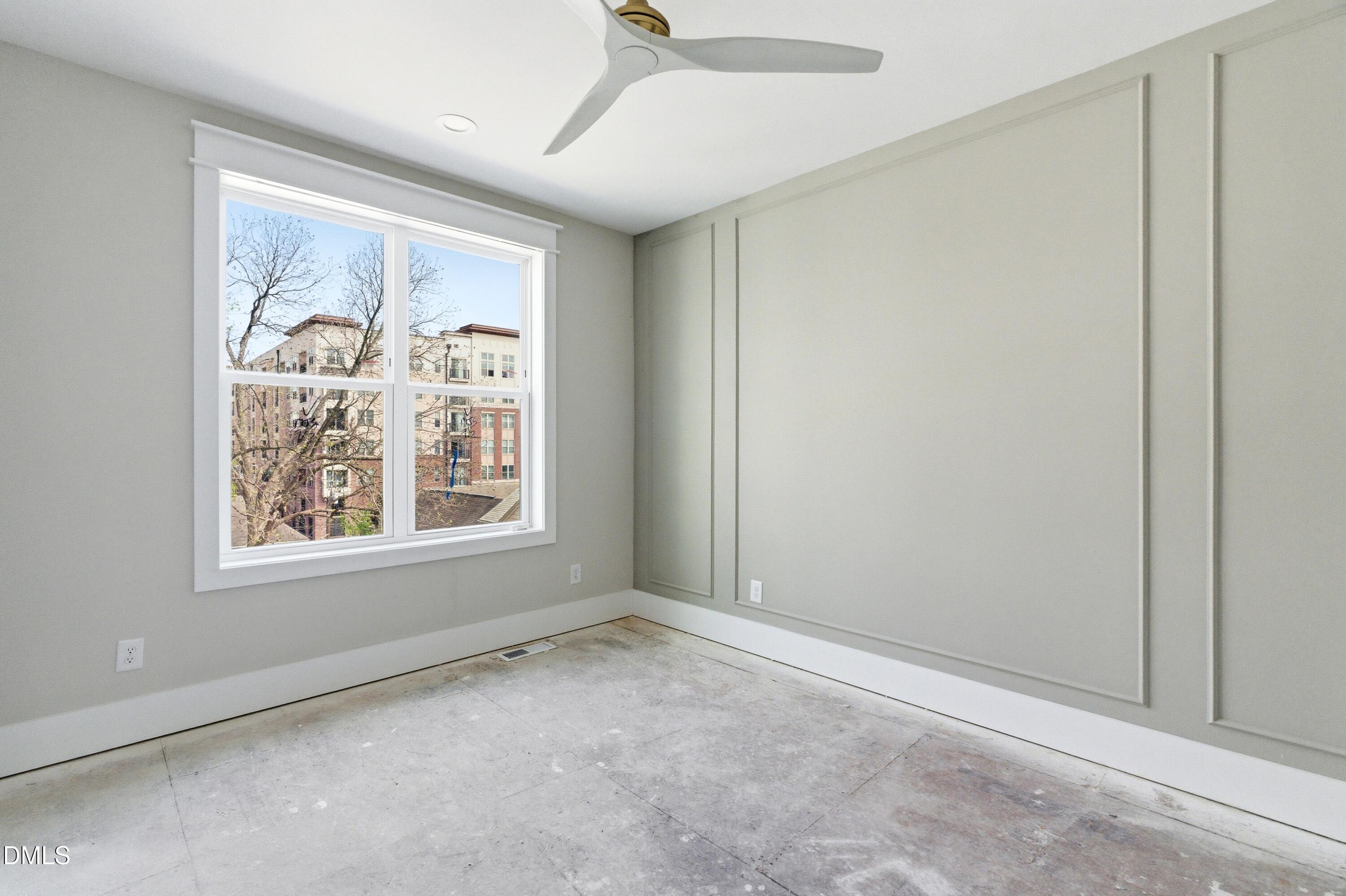 720 Noble Town Way, Unit 106 Raleigh, NC 27603 - Photo 11 of 28 a view of an empty room with a window