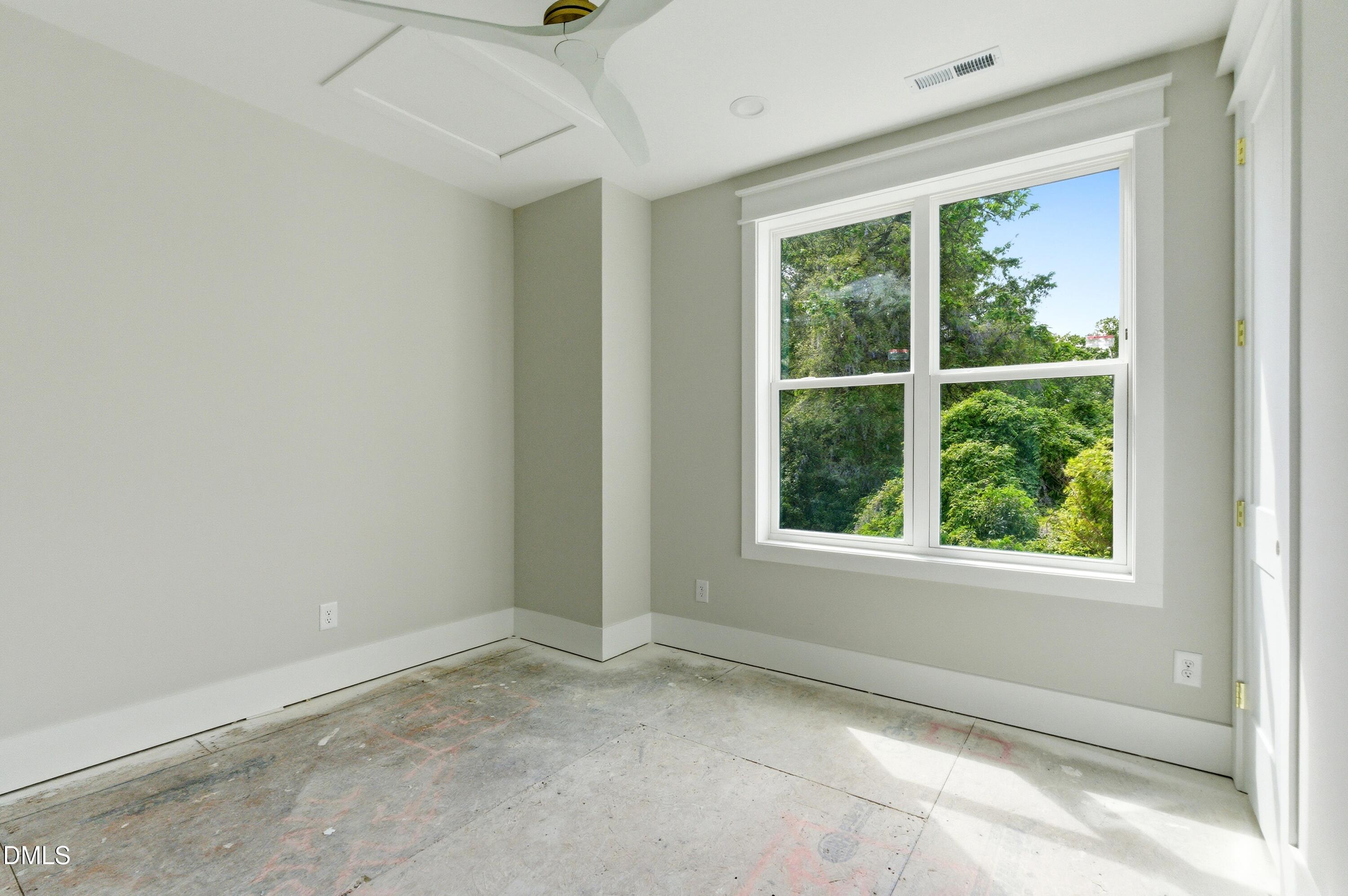 720 Noble Town Way, Unit 106 Raleigh, NC 27603 - Photo 12 of 28 an empty room with a window