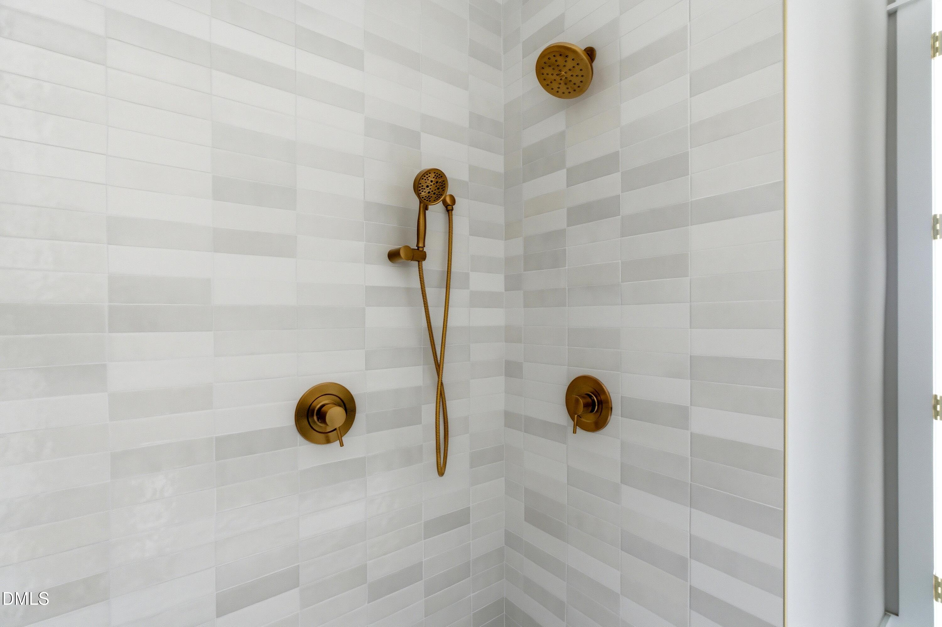 720 Noble Town Way, Unit 106 Raleigh, NC 27603 - Photo 16 of 28 a bathroom with a shower