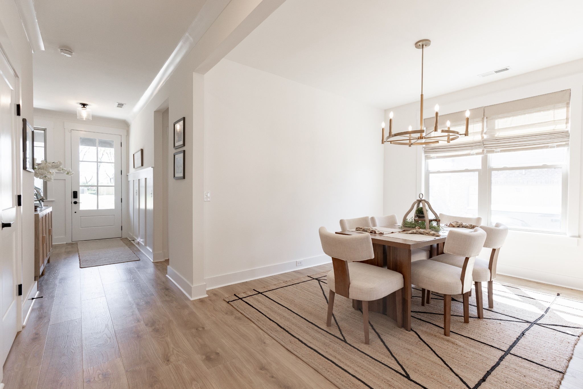 194 Phillips Bend Spring Hill Spring Hill, TN 37174 - Photo 13 of 70 a dining room with furniture a chandelier and wooden floor