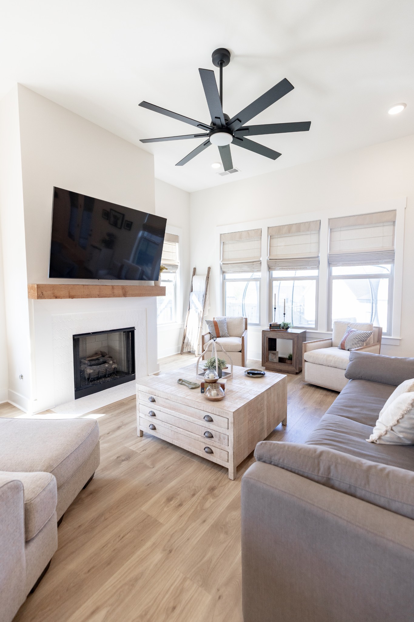 194 Phillips Bend Spring Hill Spring Hill, TN 37174 - Photo 22 of 70 a living room with furniture a flat screen tv and a fireplace