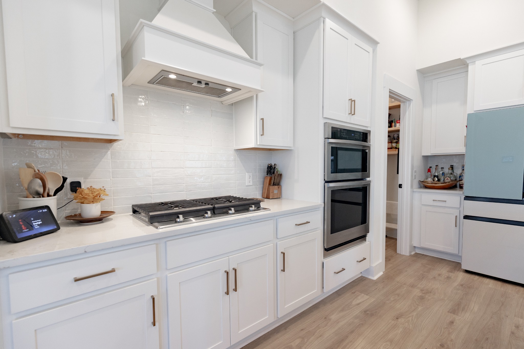 194 Phillips Bend Spring Hill Spring Hill, TN 37174 - Photo 30 of 70 a kitchen with cabinets stainless steel appliances and wooden floor