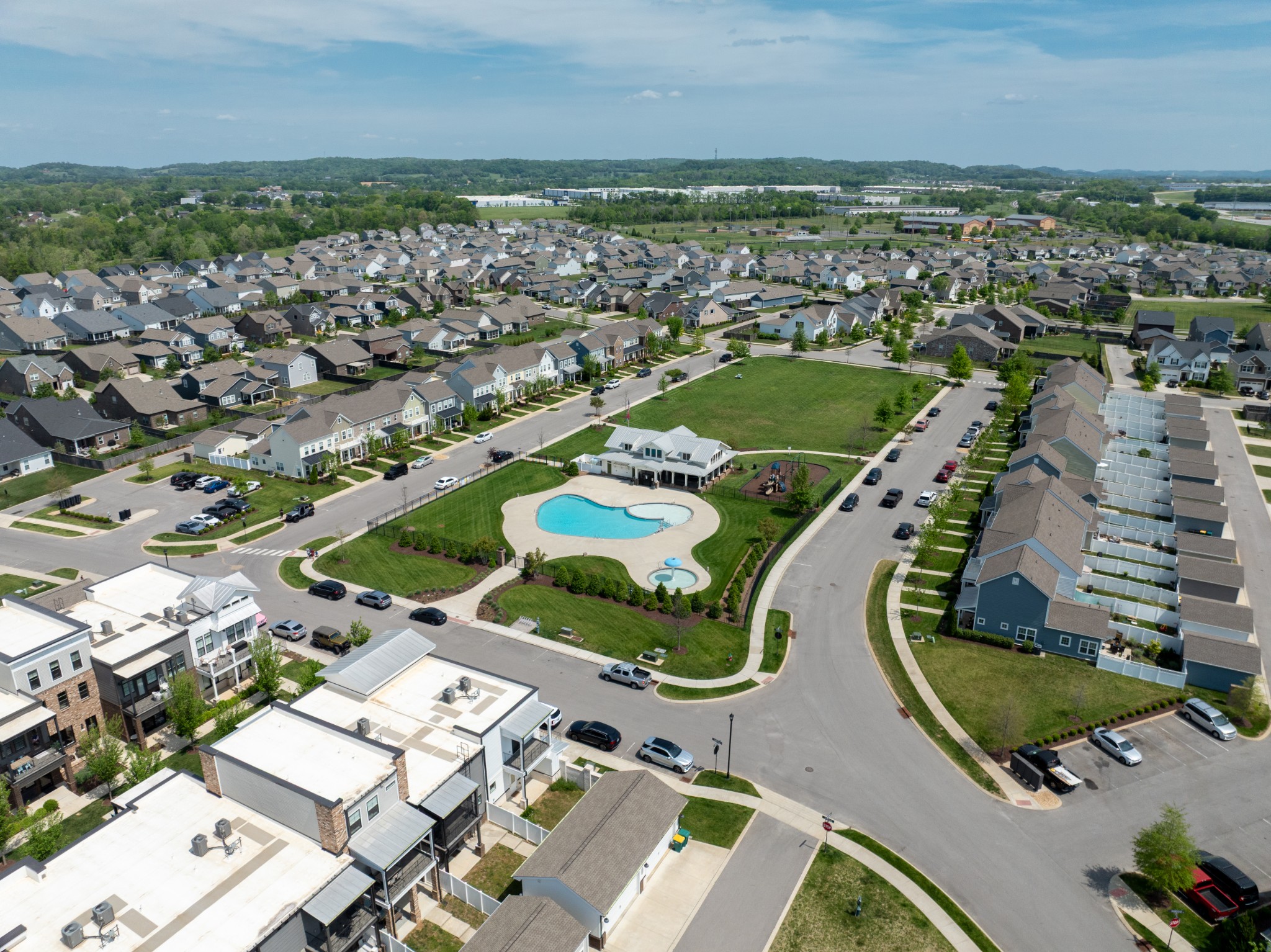 194 Phillips Bend Spring Hill Spring Hill, TN 37174 - Photo 69 of 70 an aerial view of a city with lots of residential buildings and ocean view in back