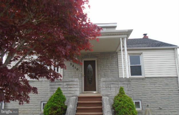3210 Lynch Road Baltimore, MD 21219 - Photo 1 of 15 a view of a house with a garage