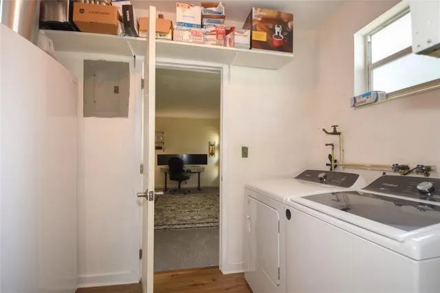 a utility room with dryer and washer