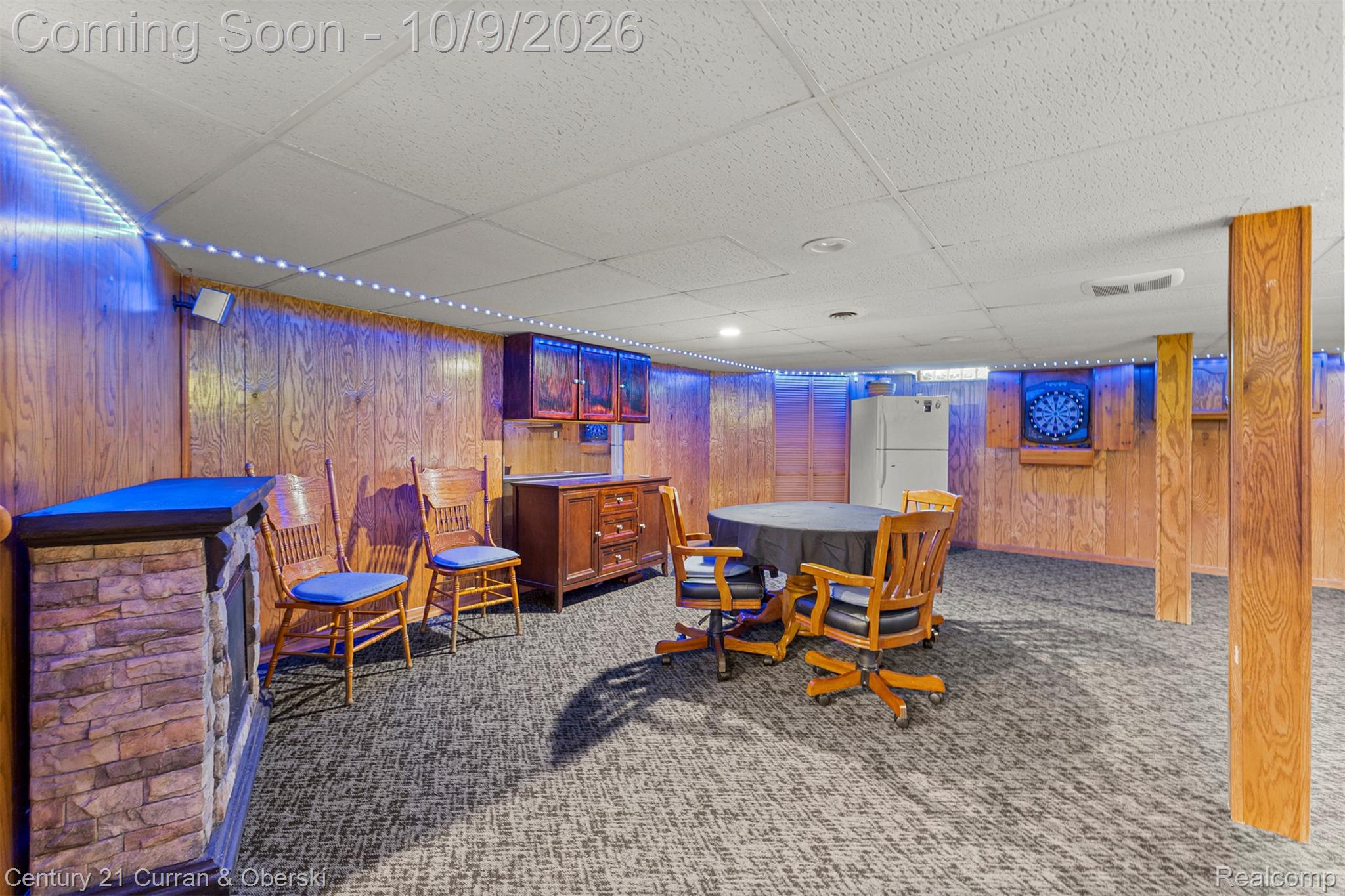 43040 Willis Road Belleville, MI 48111 - Photo 37 of 65 Lower level featuring wood paneling, recessed lighting, drop ceiling, and carpeted flooring