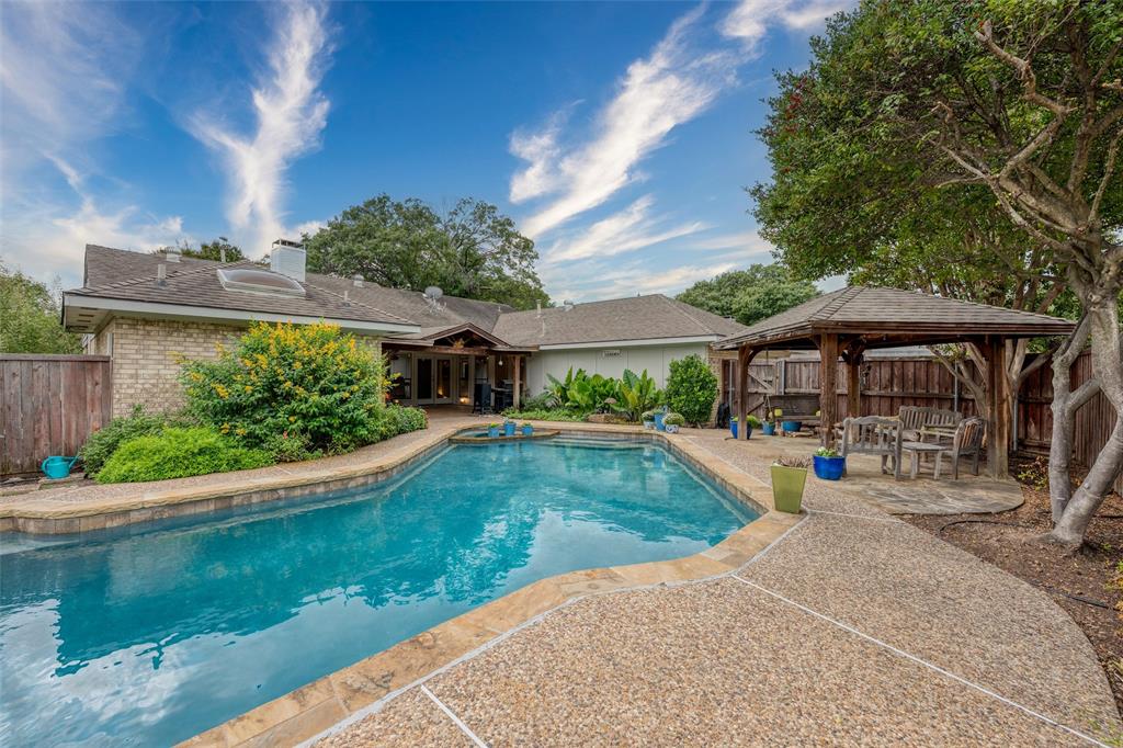 Gorgeous Pool with New equipment in 2023 and 2 covered patio areas for outdoor entertainment!
