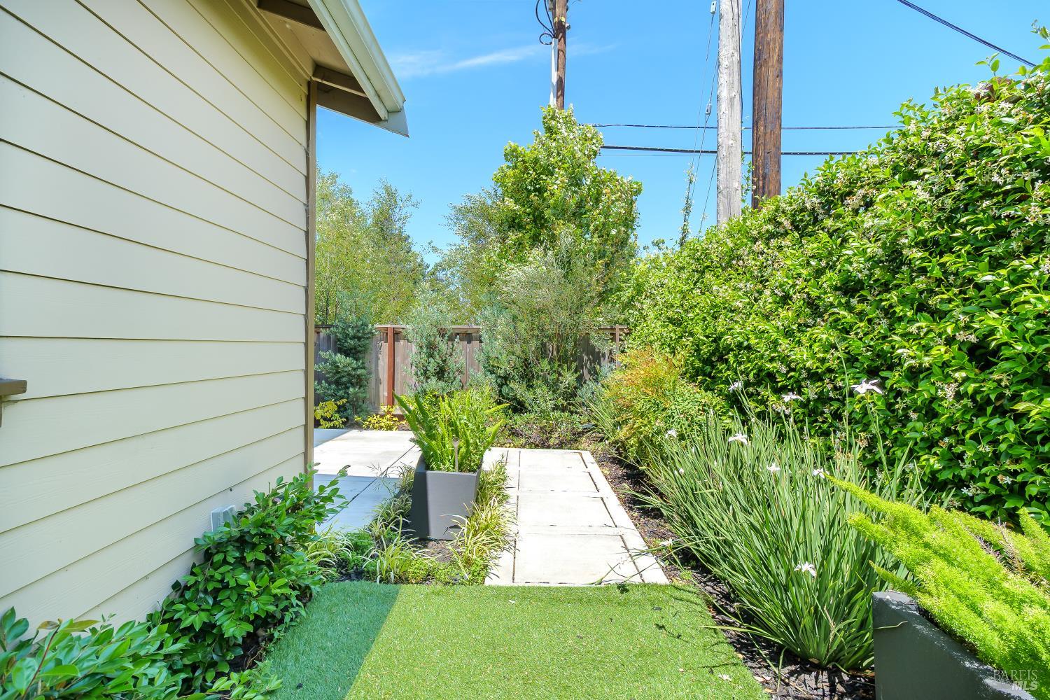1201 Del Rancho Way Petaluma, CA 94954 - Photo 16 of 56 a view of a backyard with pathway