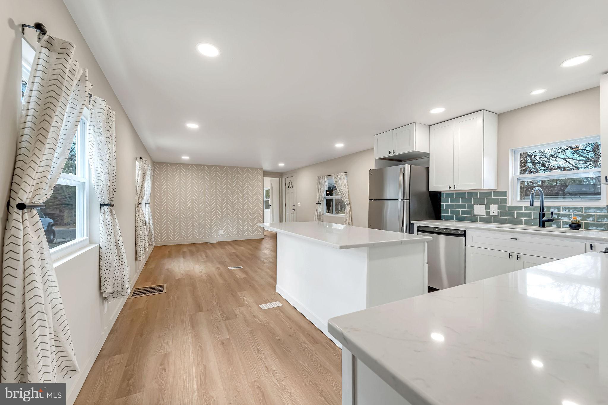 3620 Weymouth Road Browns Mills, NJ 08015 - Photo 16 of 27 a kitchen with stainless steel appliances a refrigerator sink and cabinets