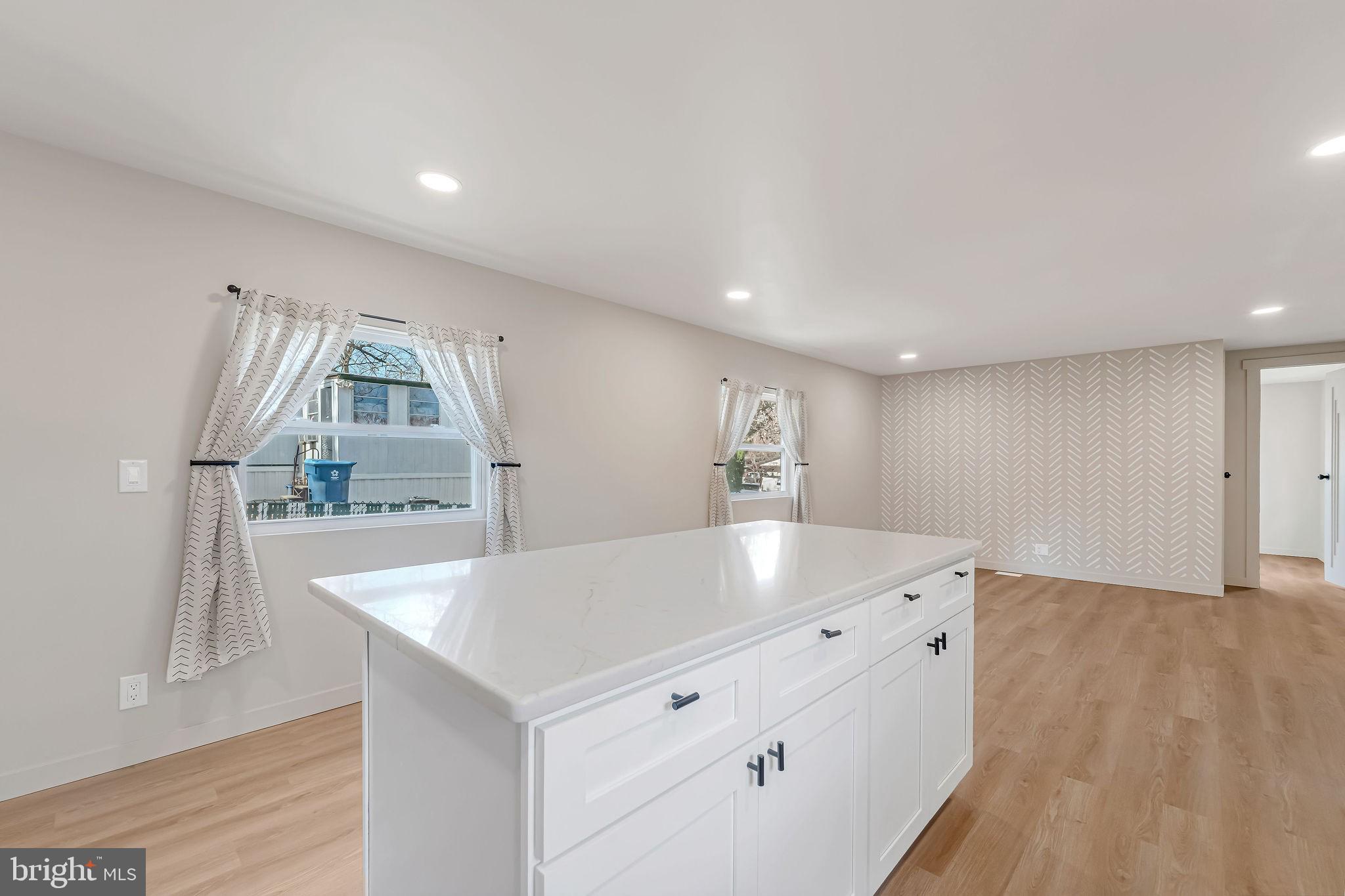3620 Weymouth Road Browns Mills, NJ 08015 - Photo 17 of 27 a living room with stainless steel appliances wooden floor dining table and wooden floor