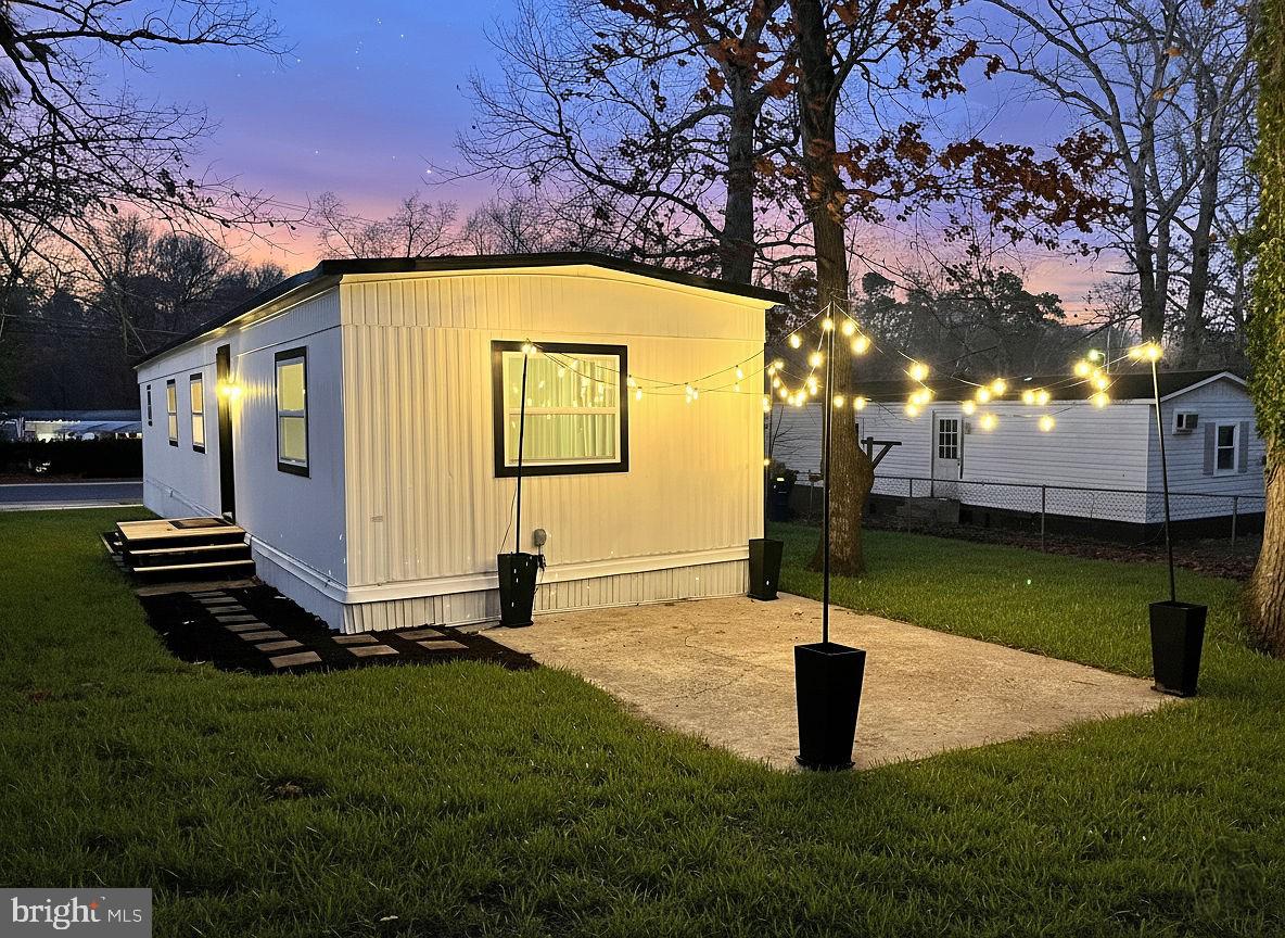 3620 Weymouth Road Browns Mills, NJ 08015 - Photo 2 of 27 a front view of a house with a yard