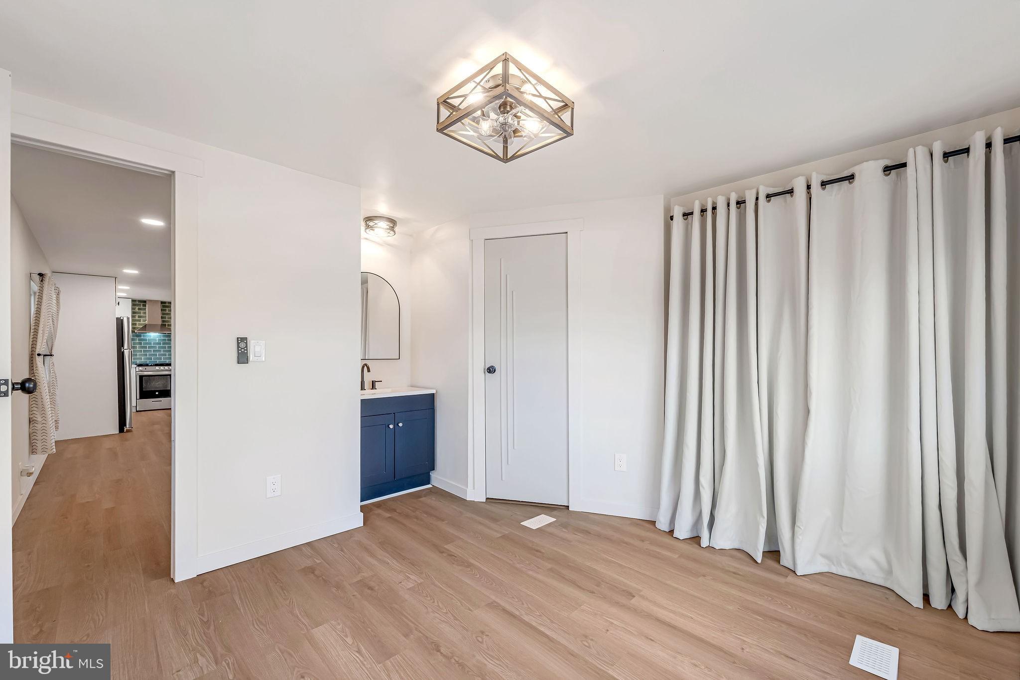 3620 Weymouth Road Browns Mills, NJ 08015 - Photo 24 of 27 wooden floor in an empty room with a window